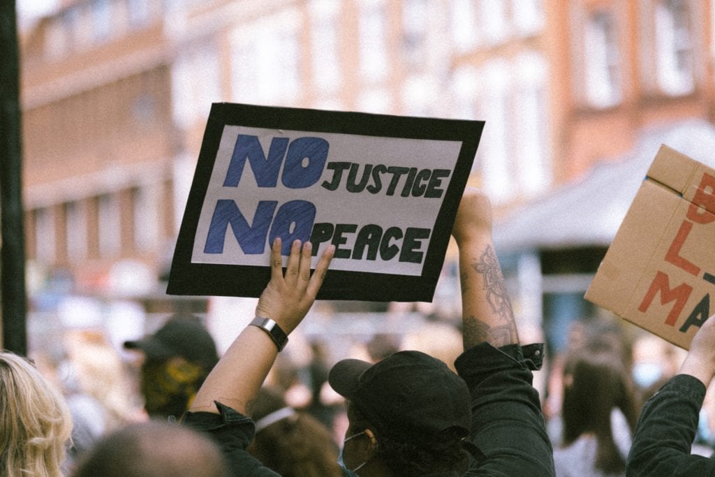 protest sign no justice no peace