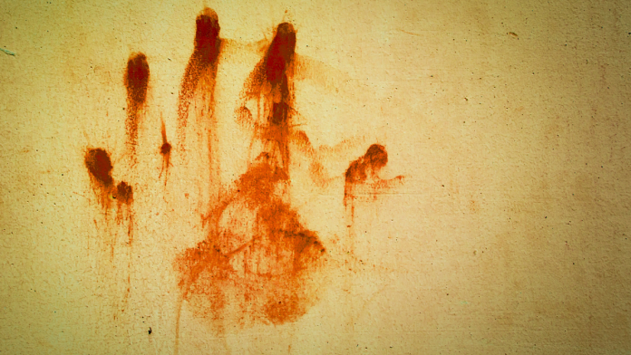 artwork for the changeling. A red, bloody handprint on a yellow wall